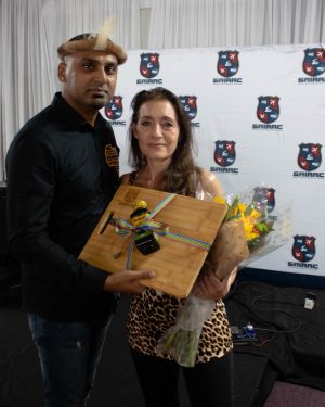 In honour of the late Fellow Bernie Piras, Kevin Moodley is presenting a personal gift to Jenny Piras. In honour of the late Fellow Bernie Piras, Kevin Moodley is presenting a personal gift to Jenny Piras.